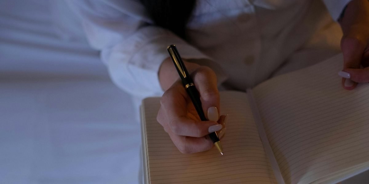 Notebook with calming notes and pen