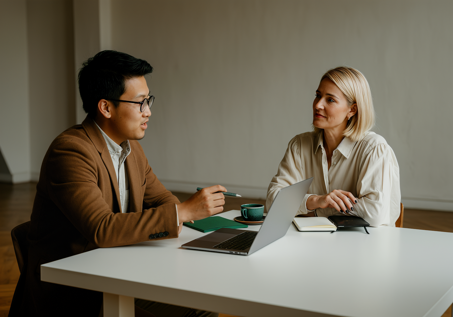 A scene depicting a therapist and a client in a comfortable, professional setting during a therapy session, engaging in a supportive conversation.