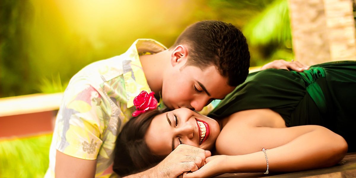 A happy couple enjoying time together, reflecting long-term benefits of relationship therapy.