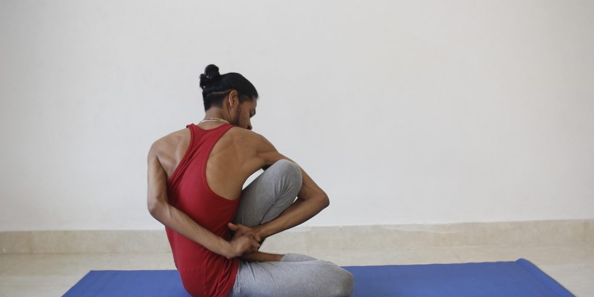 An individual engaging in deep breathing, a simple technique to calm anxious feelings.