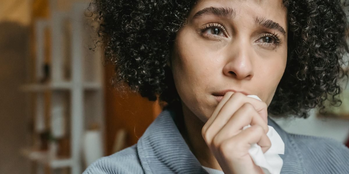 A person looking worried and thoughtful, reflecting the internal struggle of anxiety when separated from loved ones.