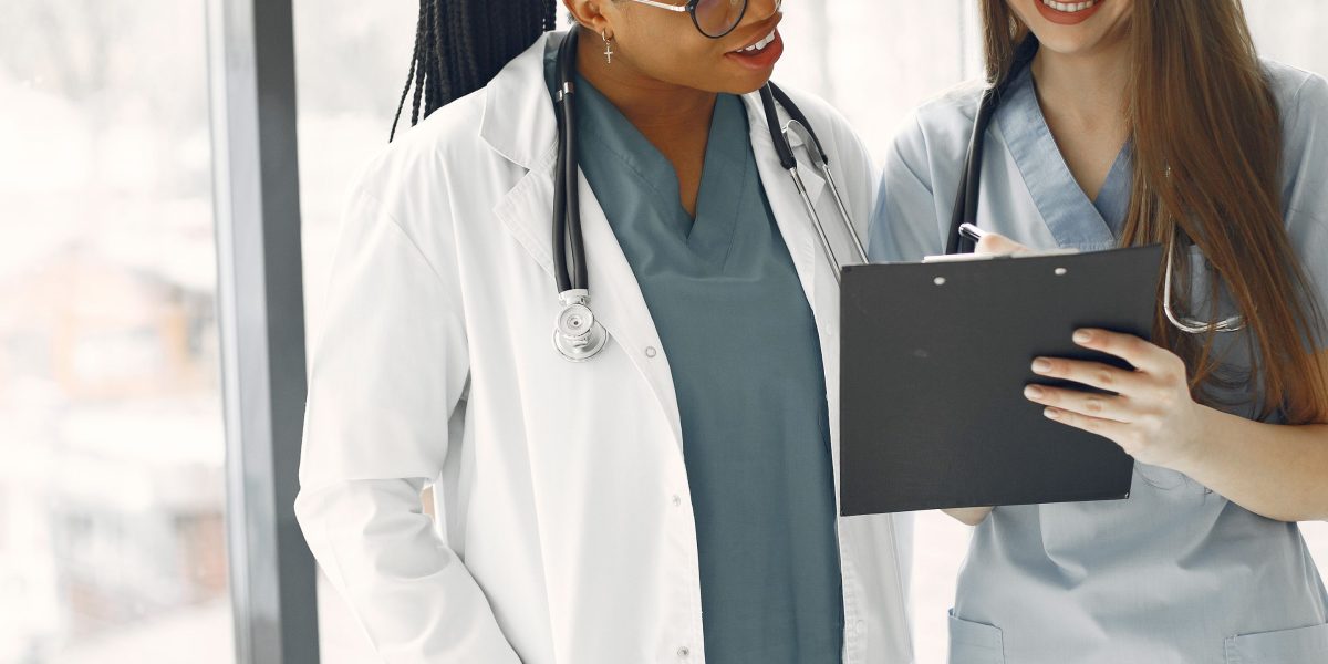 A diverse team of healthcare professionals collaborating to develop a comprehensive patient care plan.