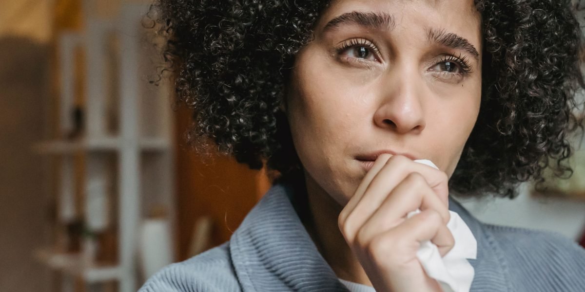 A person looking thoughtful or overwhelmed, symbolizing common anxious feelings.